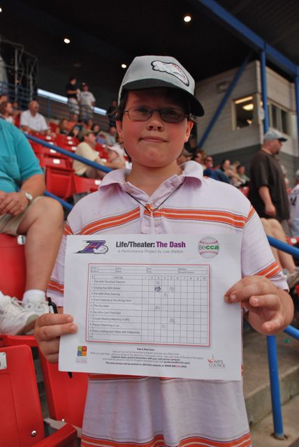 Fan with FIlled out Scorecard